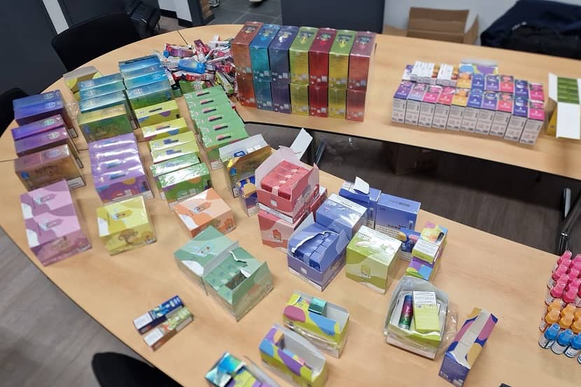 confiscated vapes on a table