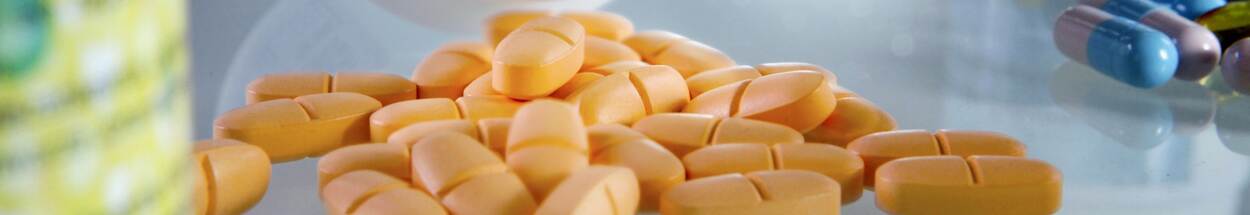Oranje vitaminepillen