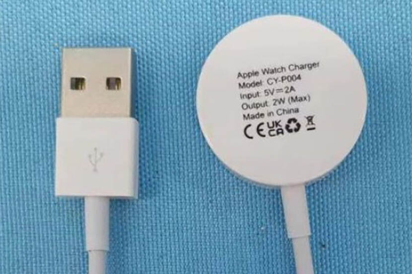Apple watch USB lader op blauwe achtergrond