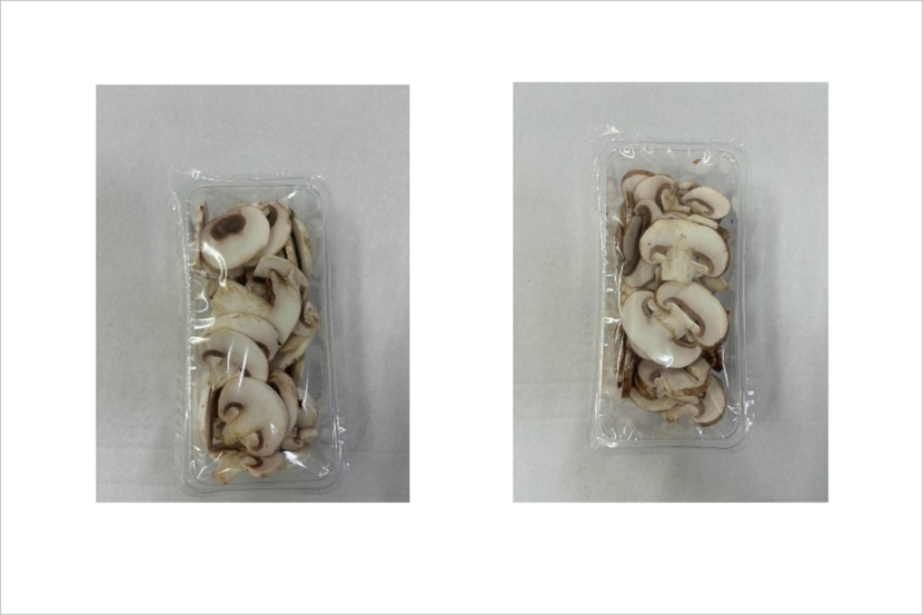 Twee bakjes met gesneden champignons